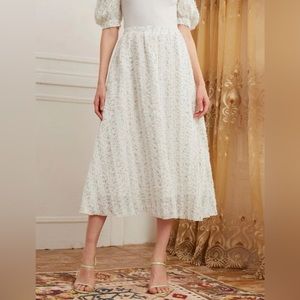 White midi skirt with floral pattern